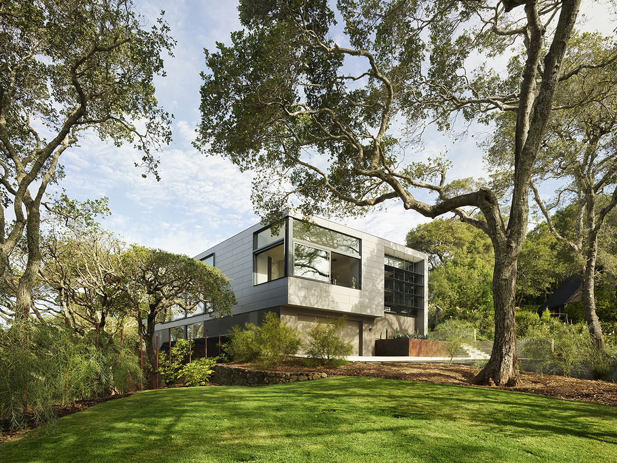 Ross Hillside modern home outside view of full house with green area