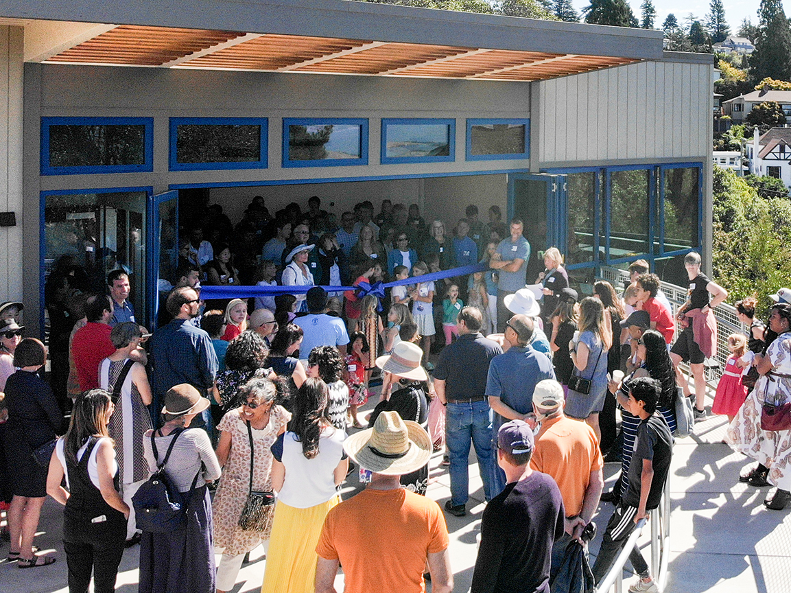 Step one School outside view, cutting the ribbon at opening ceremony, lots of people